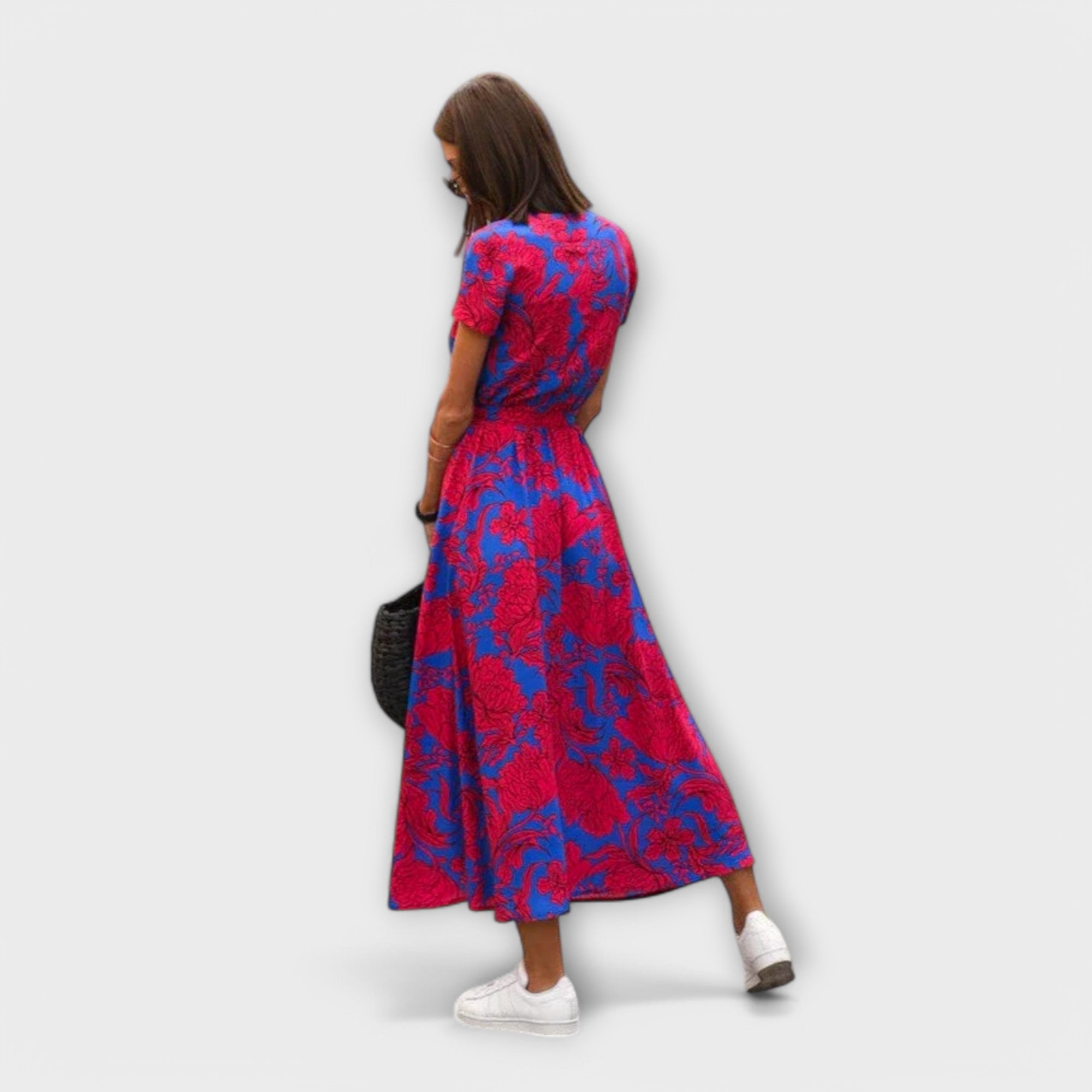 Yelina – Midikleid mit Wickeloptik und floraler Energie